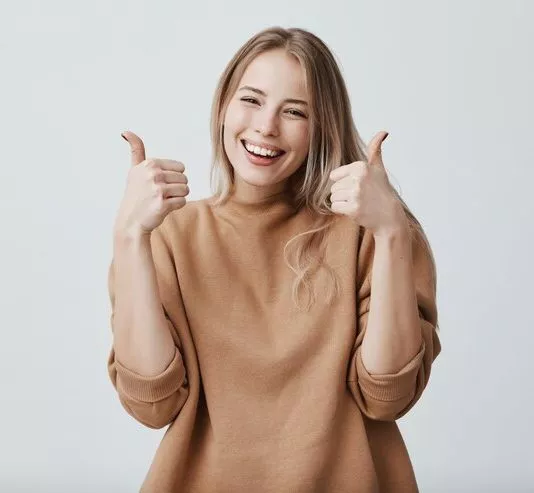 Portrait Fair Haired Beautiful Female Woman With Broad Smile Thumbs Up 176420 14970 E1753972252249